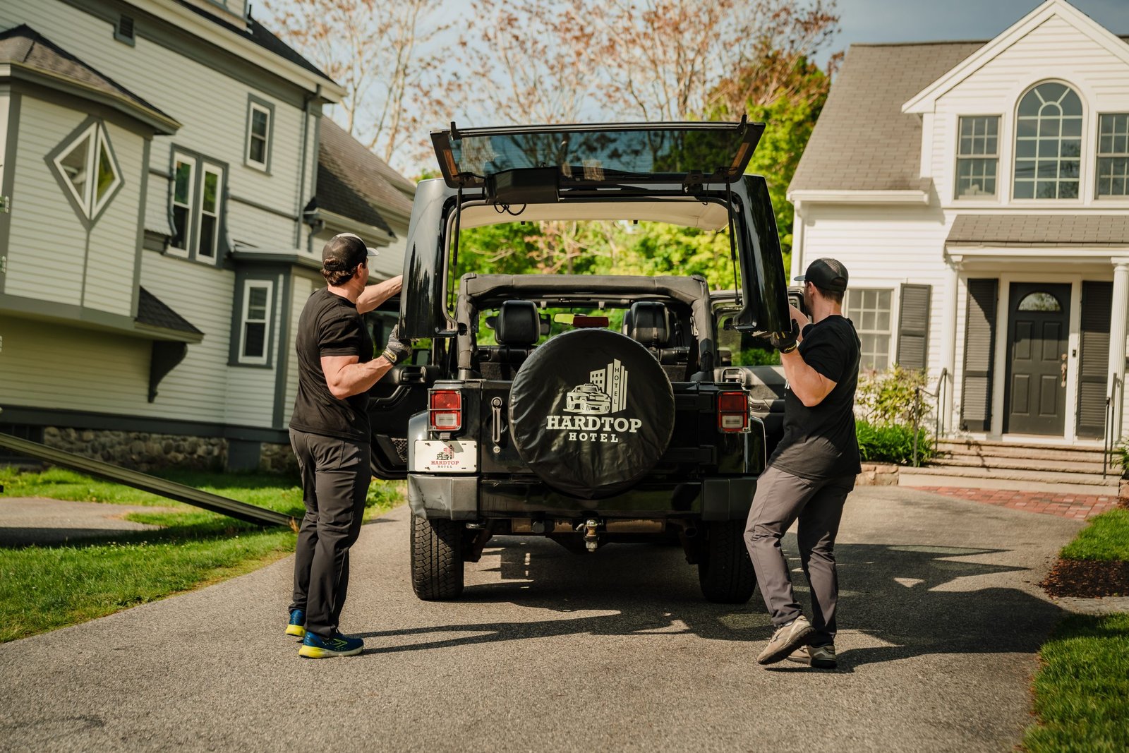 Ryan and Cole working together to remove a customer’s HardTop at North Chelmsford