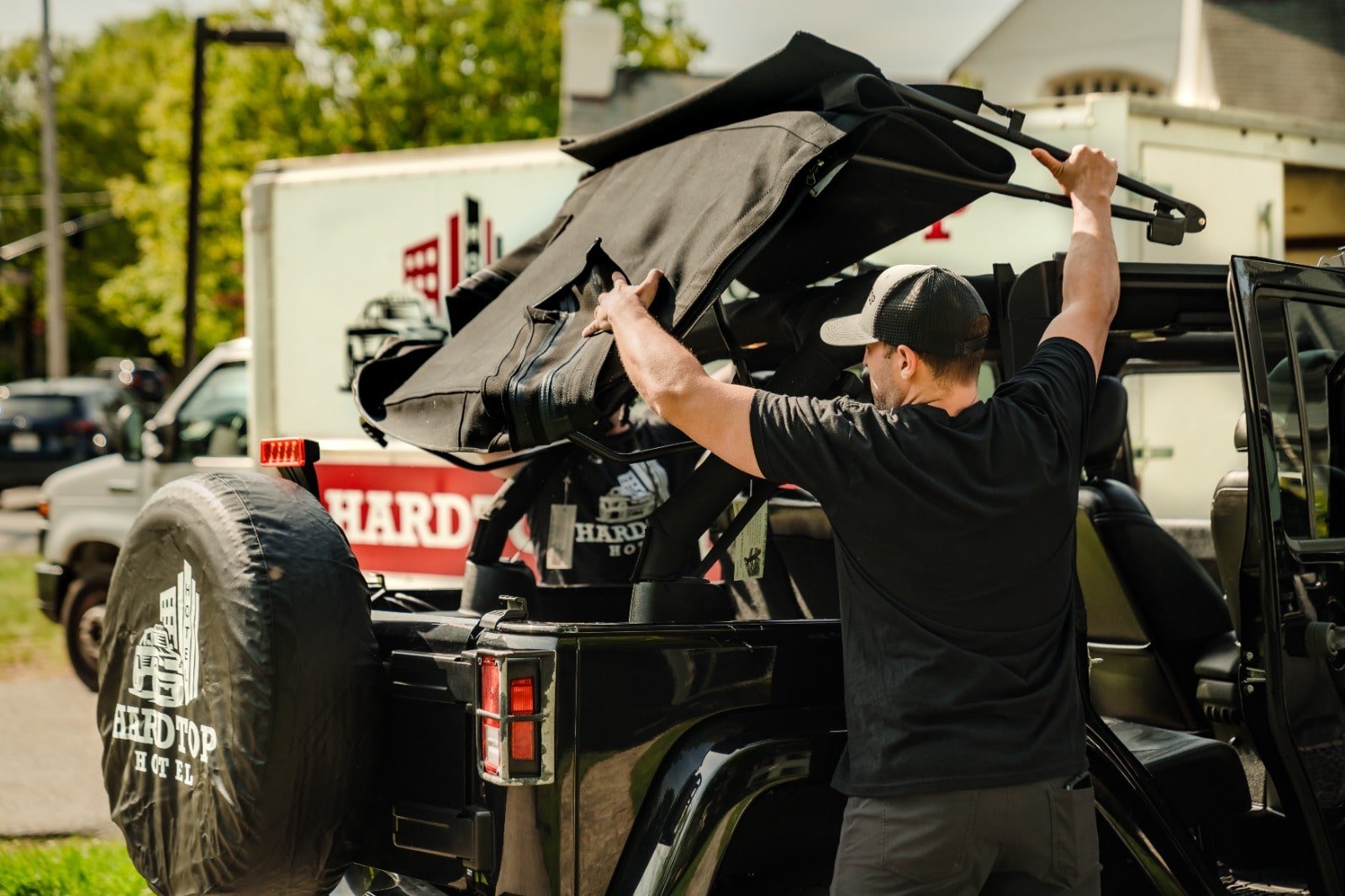Ryan(CEO) removing a Jeep SoftTop during installation at North Chelmsford